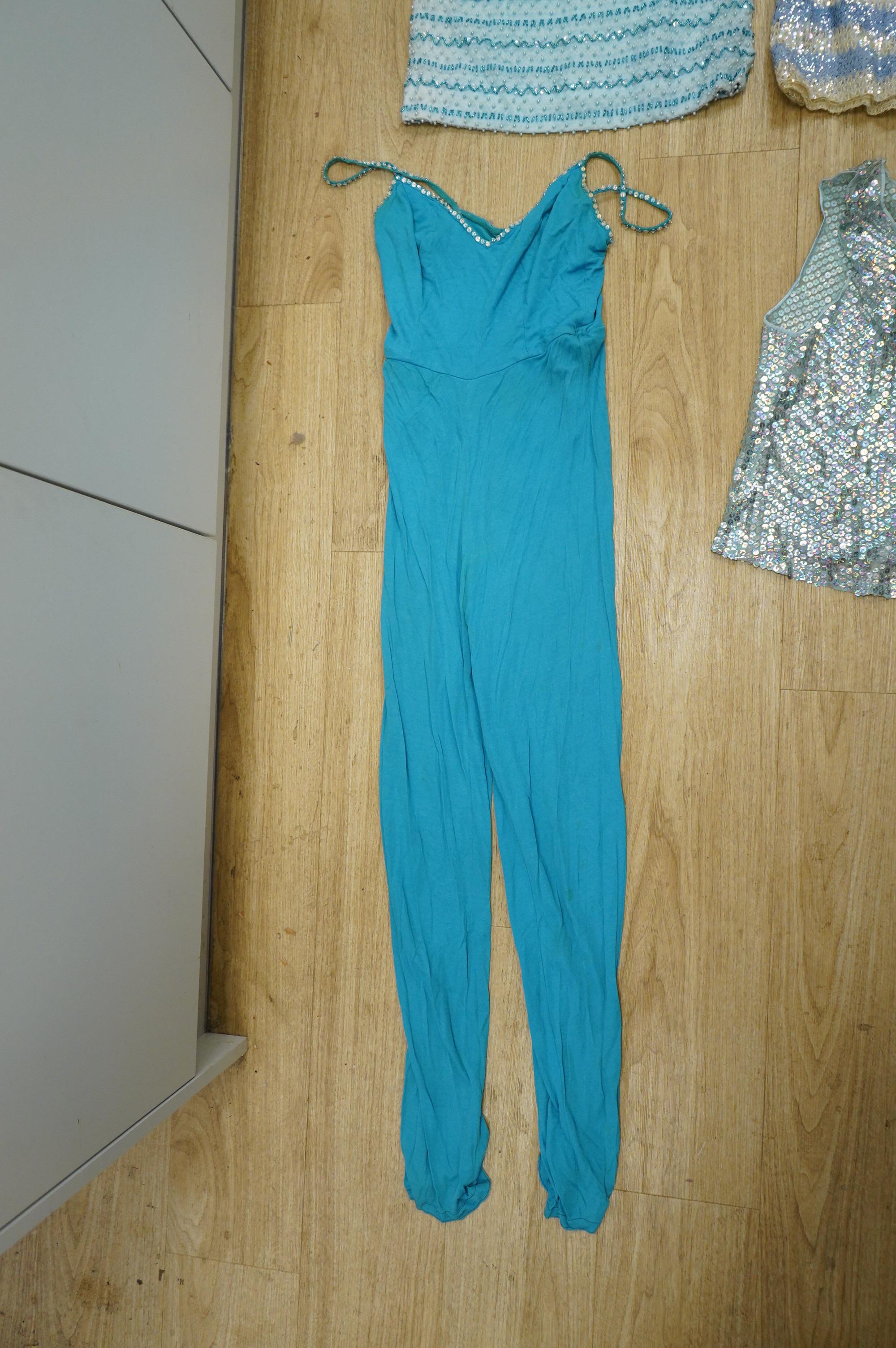 Two 1960's beaded mini dresses, a sequin top and later jumpsuit